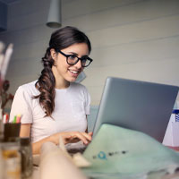 Person looking at a laptop