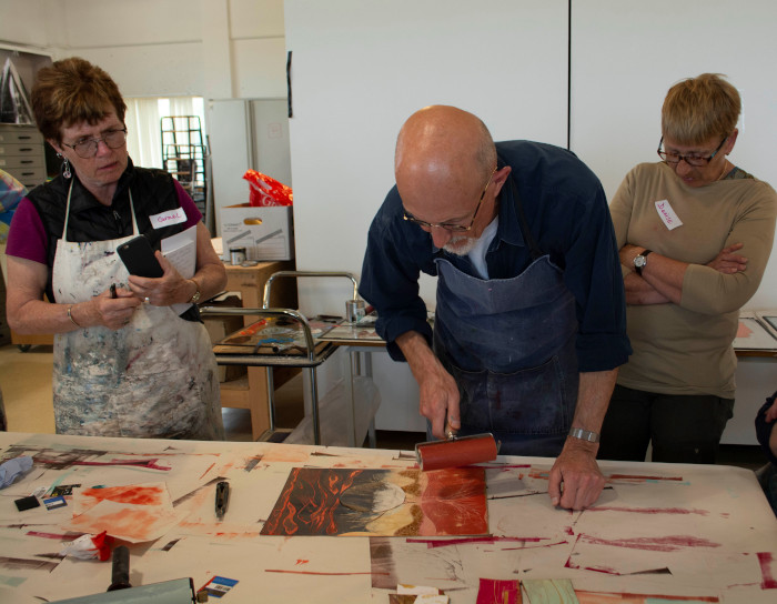 Charles Shearer at printing workshop