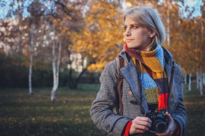 A person holding a camera