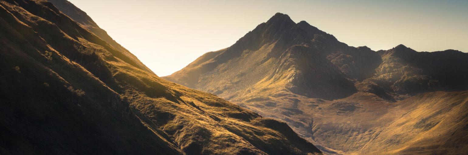 image of a remote hillside at sunset