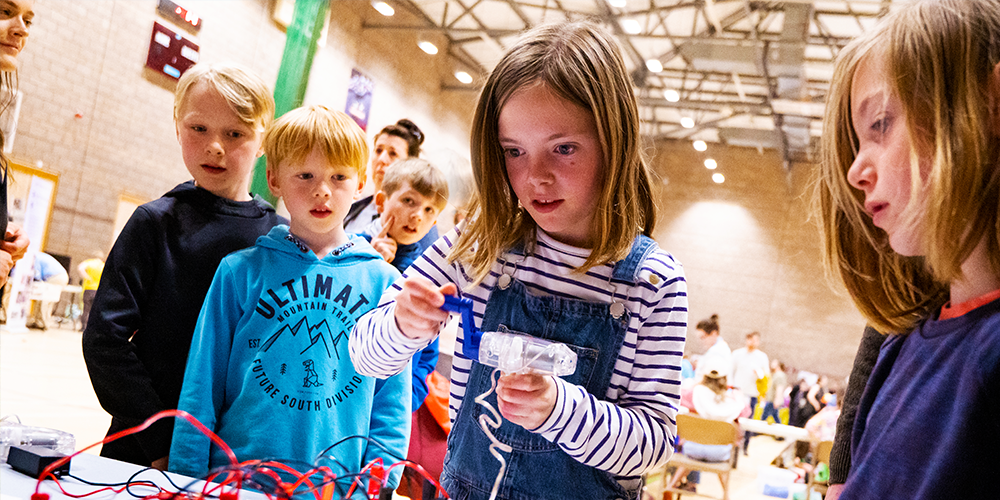 Students engaging with a science experiment.