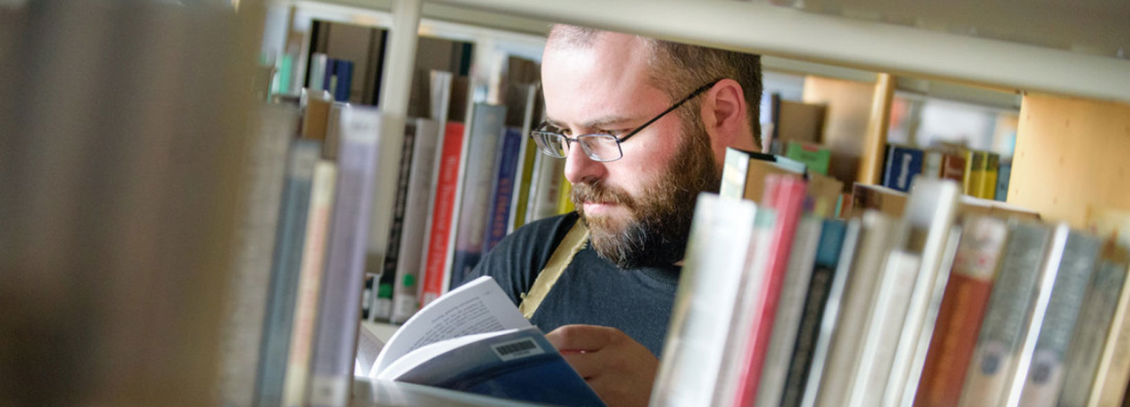 student in library