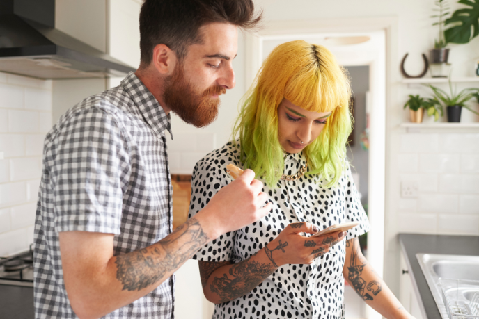 Students looking at a phone